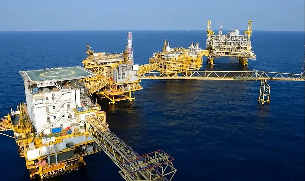 offshore oil and gas production platforms connected by bridges at sea